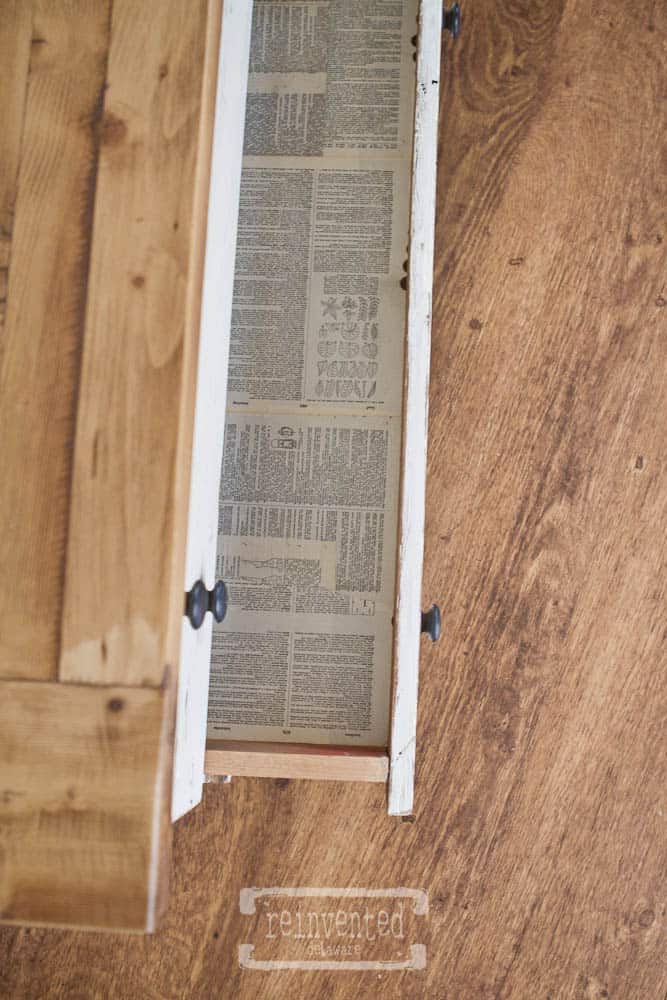 Interior of a drawer that has been lined with a DIY drawer liner method.