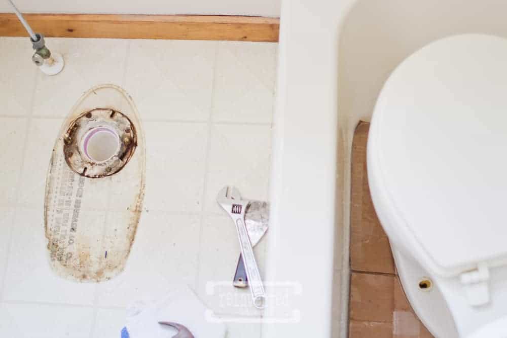 floor area after toilet was removed for e diy bathroom flooring project