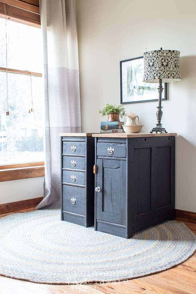 two repurposed cabinets made from antique roll top desk painted in black with handmade oak tops