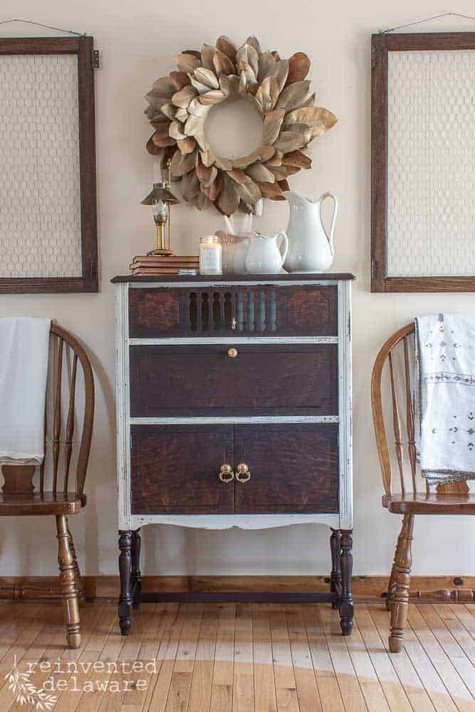 Last time we looked at this antique cabinet it had been prepped, sanded, painted, and sealed. Now it's time to see the furniture makeover before and after! #vintagefarmhouse #vintagehomedecor #paintedfurniturelove