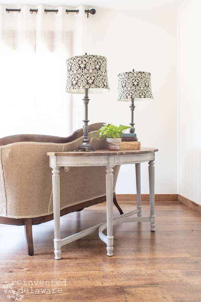 Remember the 1980's glass insert tables that were used as a sofa table??  Today, we will show you how a restyled sofa table was brought into today's farmhouse style that we all love! #refinishedfurniture #restyledfurniture #restyledfurniture