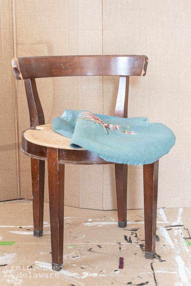 vintage vanity chair with needlepoint fabric removed from seat