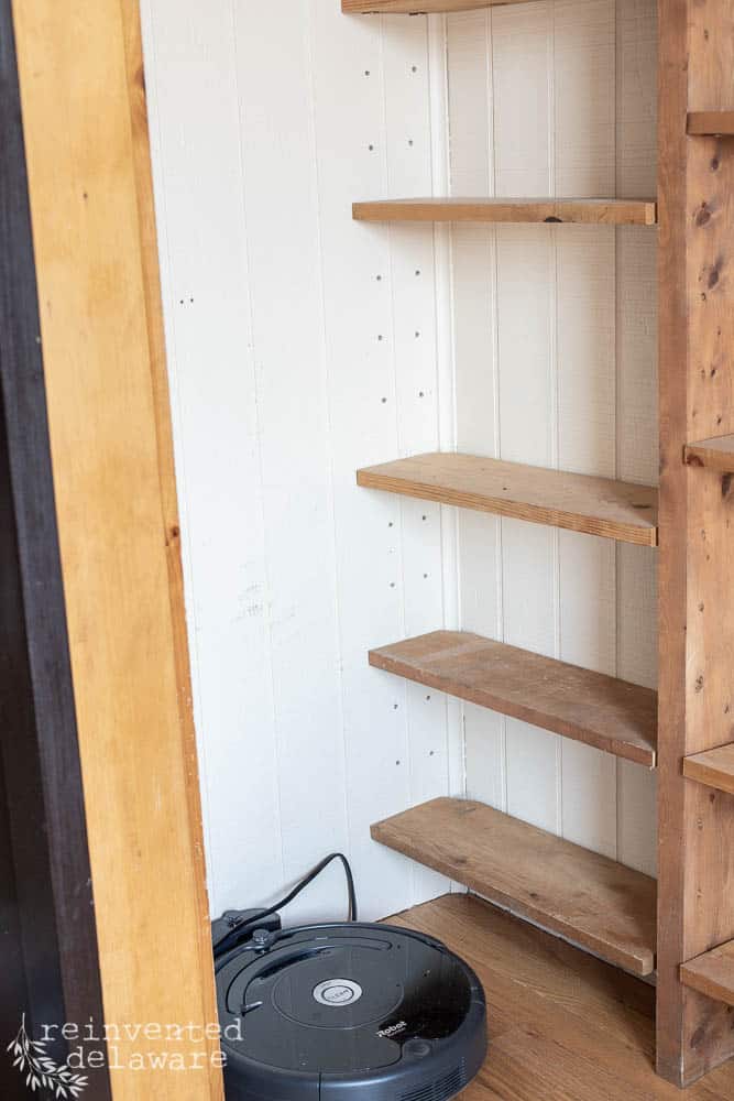 before shot of easy pantry makeover showing shelves not yet painted