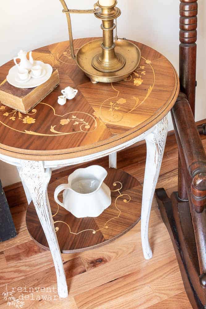 top view of restored wood inlay side table showing inlay details