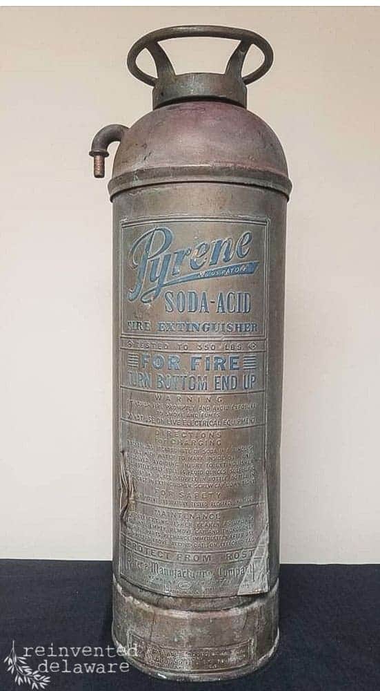 vintage and antique fire extinguisher before restoration