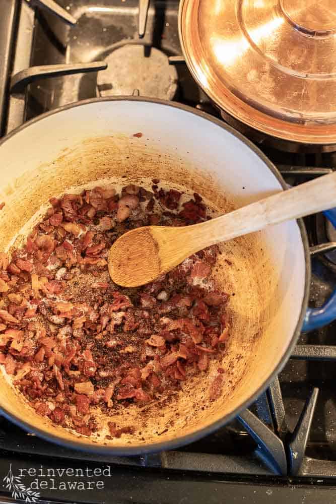 cooked bacon bits in a large dutch oven