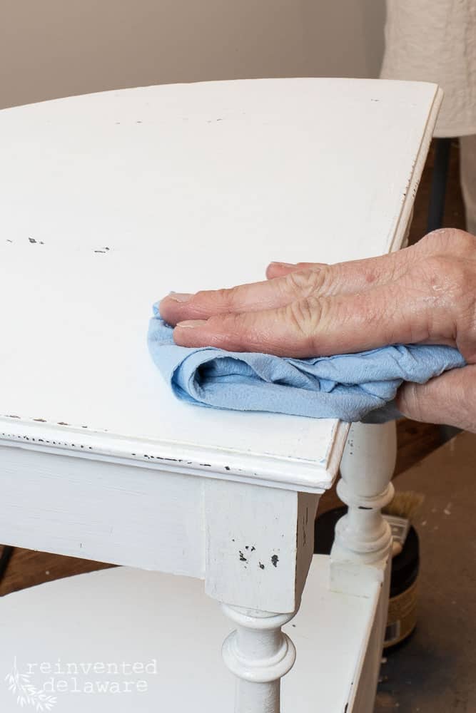 lady buffing off the excess of Big Mama's Butta