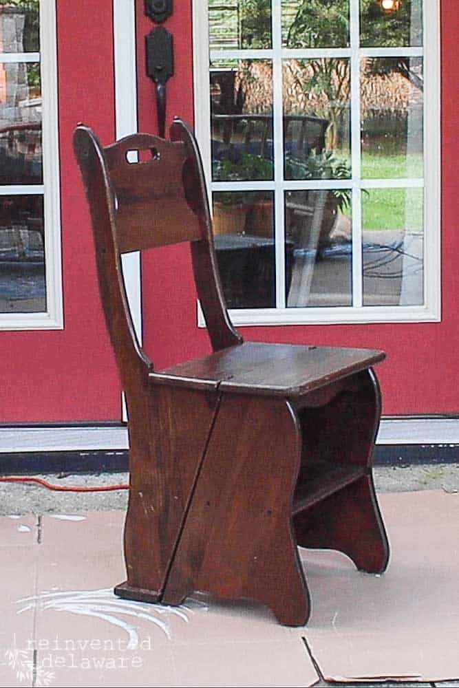 Wooden folding step stool that folds into a chair.