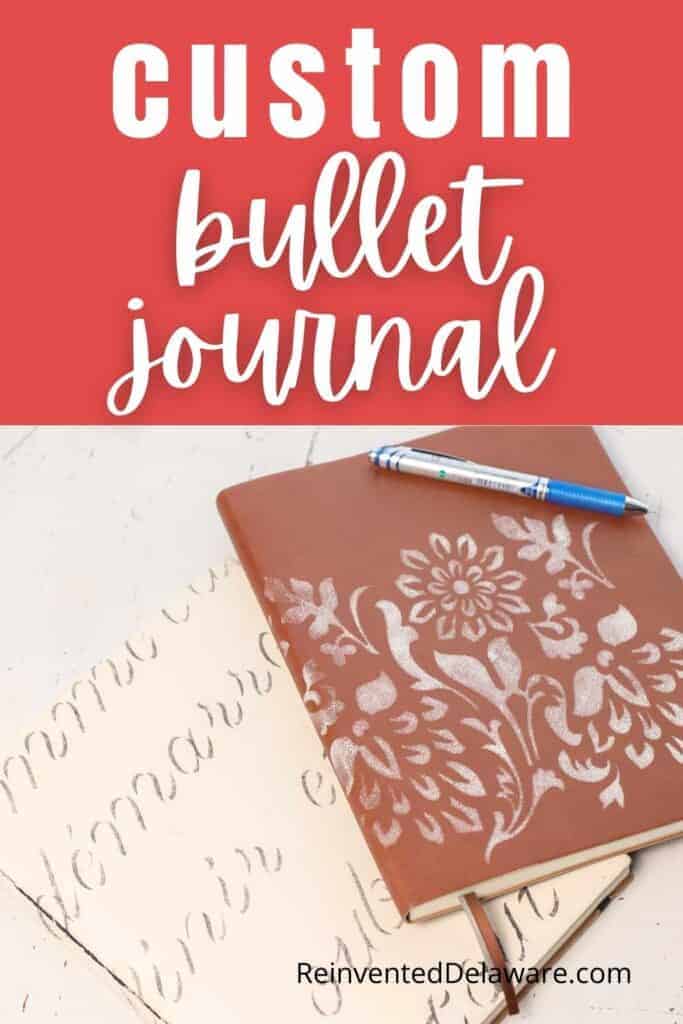 Pinterest graphic with text overlay "custom bullet journal ReinventedDelaware.com" with two different journals that have been stenciled.
