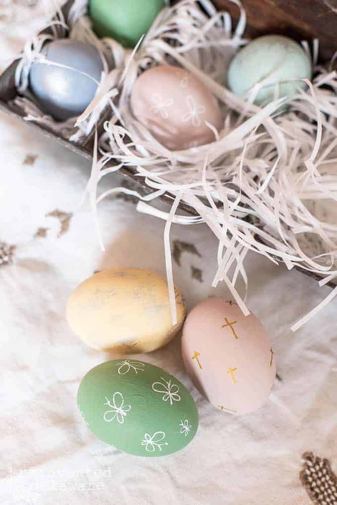 Close up of hand painted wooden eggs.