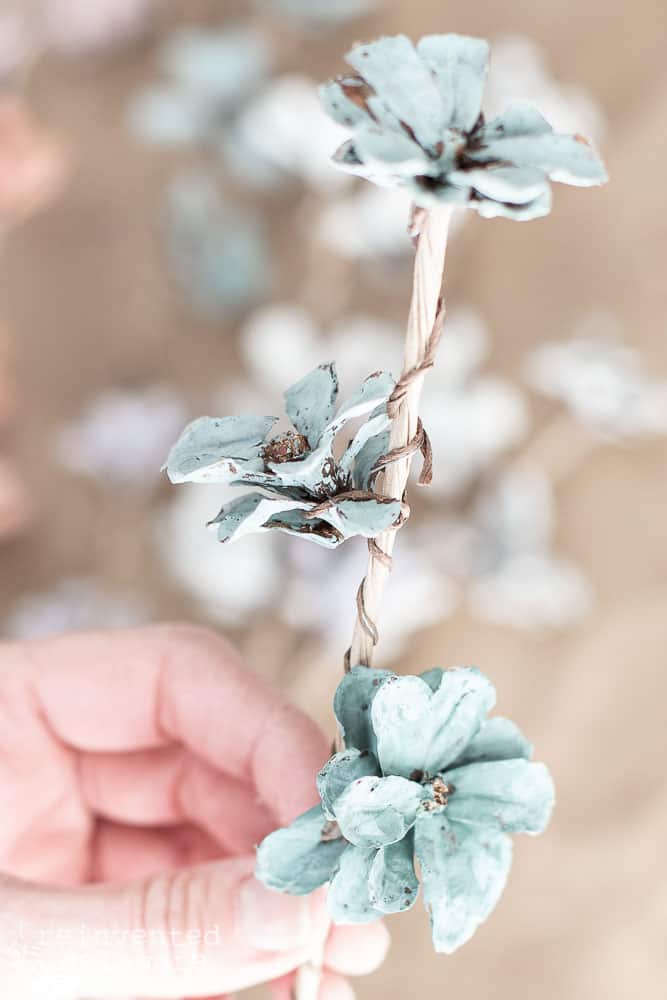 Close up of pine cone flowers that are painted in Bergere Miss Mustard Seed milk paint.