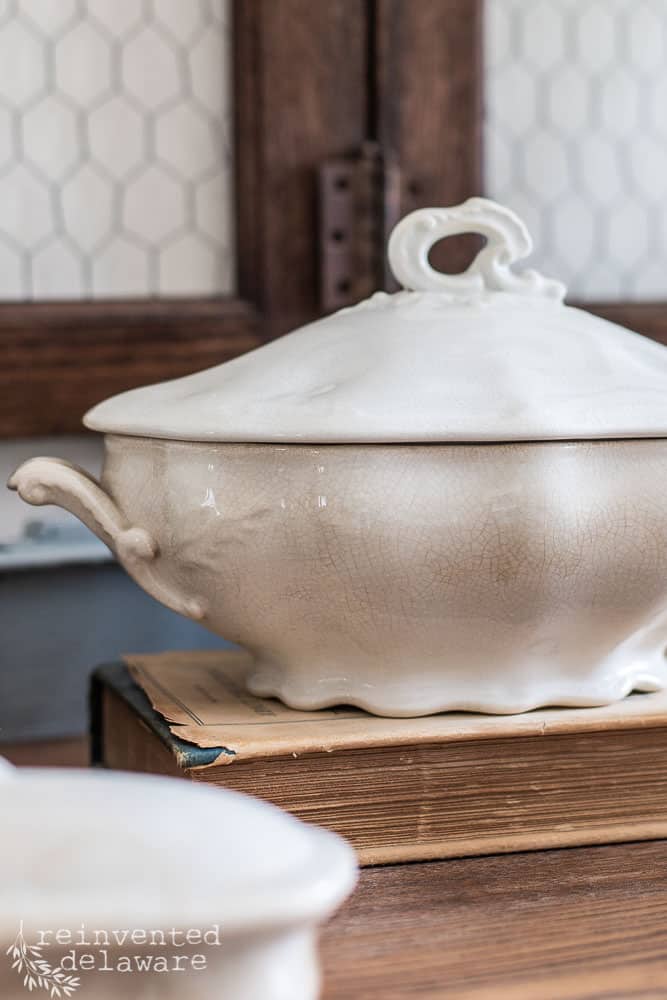 Close up of an antique ironstone soup tureen used to decorate with ironstone.