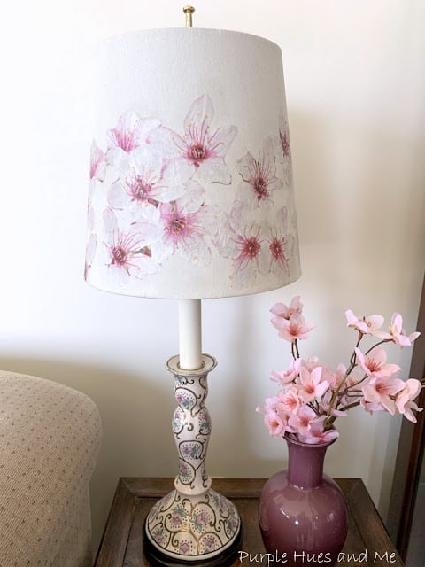 Lampshade makeover with decoupage napkin flower design.