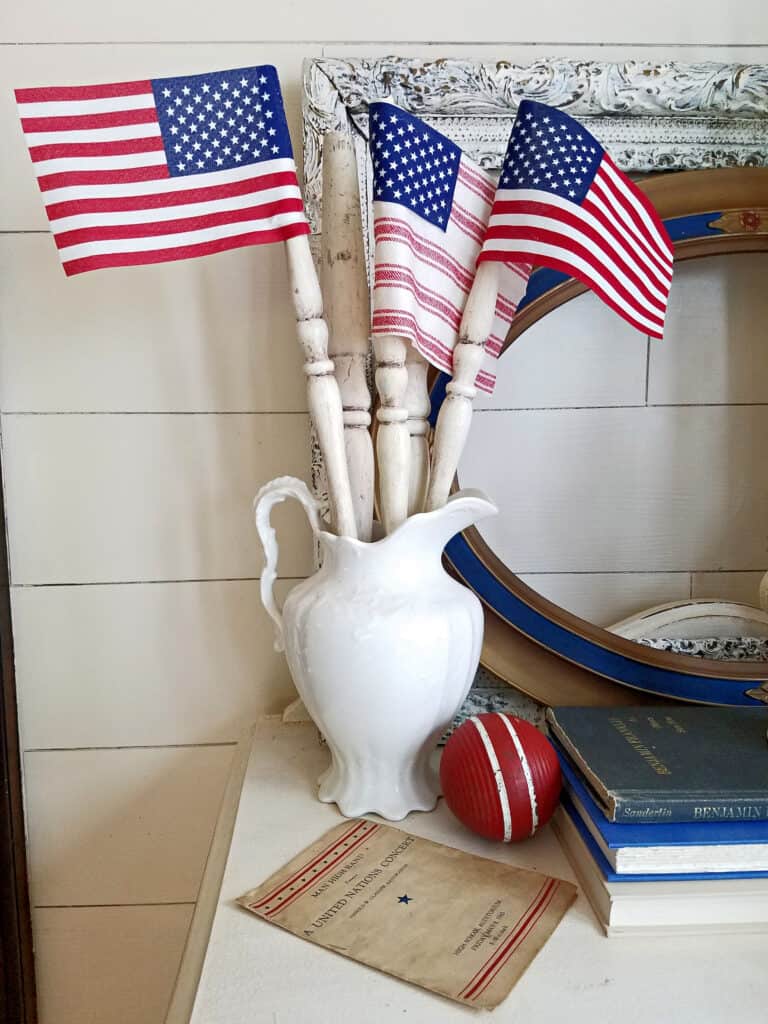Flags made with chair spindles in an ironstone pitcher.