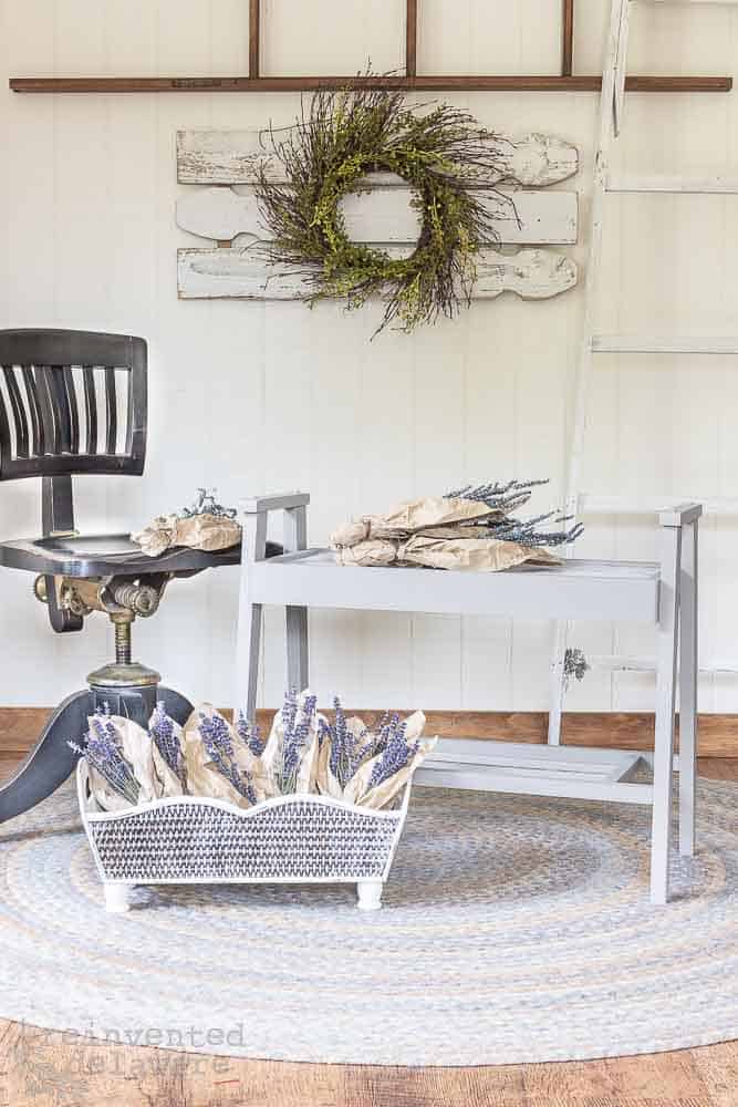 Staged mid centure side table makeover in diy boho painted furniture tutorial with peel and stick wallpaper.