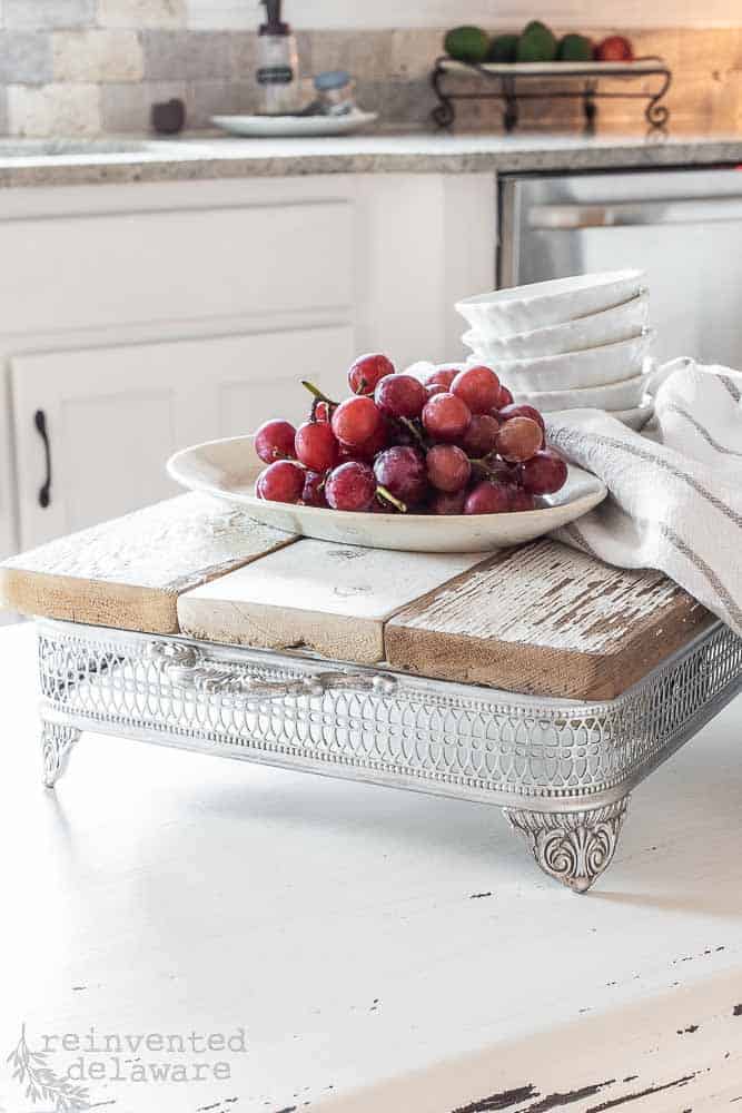 vintage chafing dish tray with reclaimed fence pickets used to make an upcycle serving tray