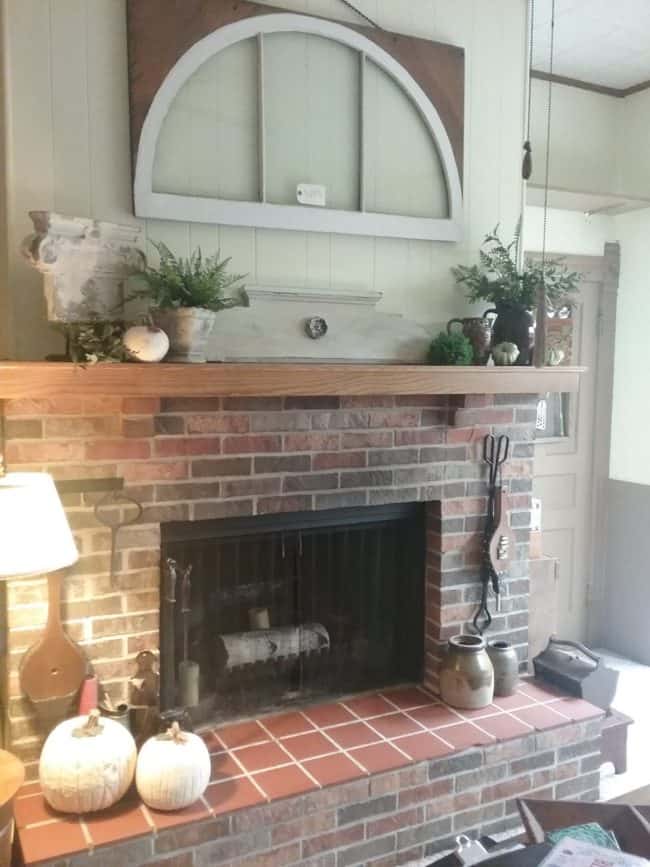 fireplace decoratd with fall decor