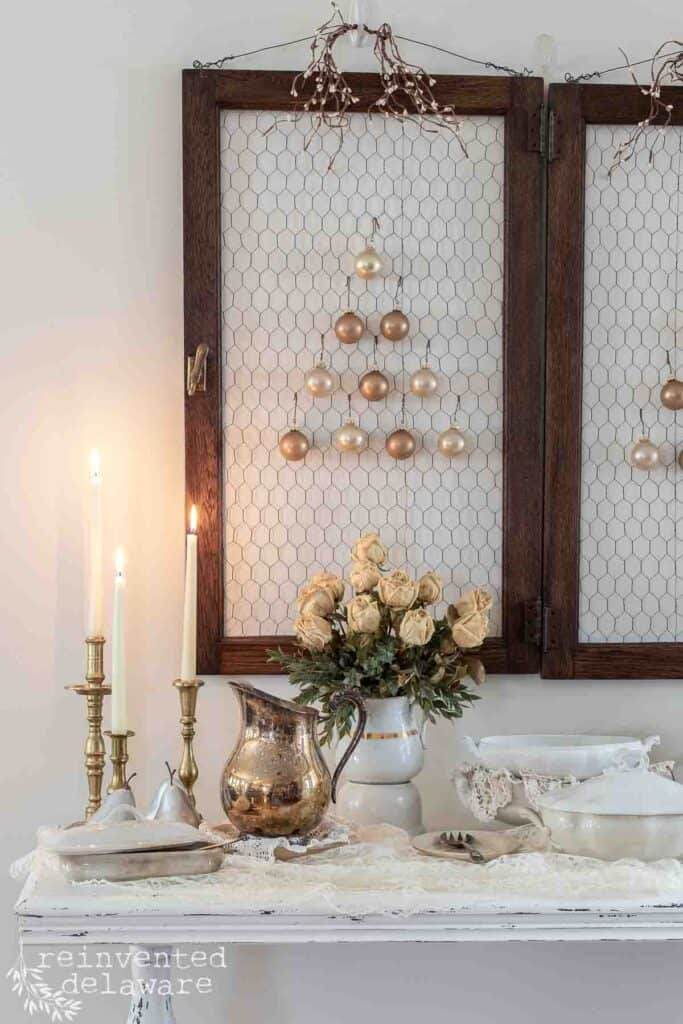 dired roses, vintage brass candlesticks on a tablescape