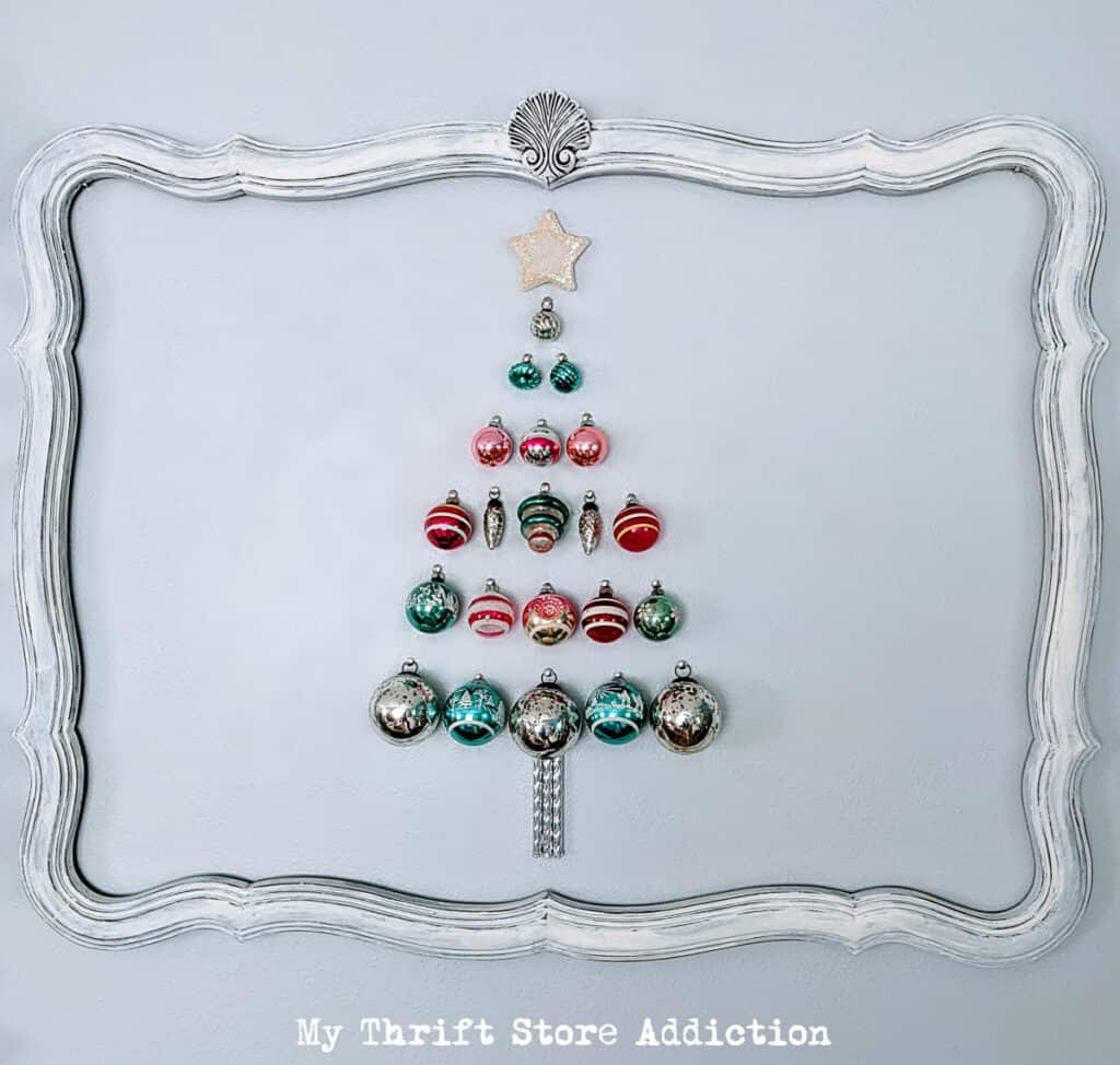 christmas tree wall hanging made from christmas ornaments