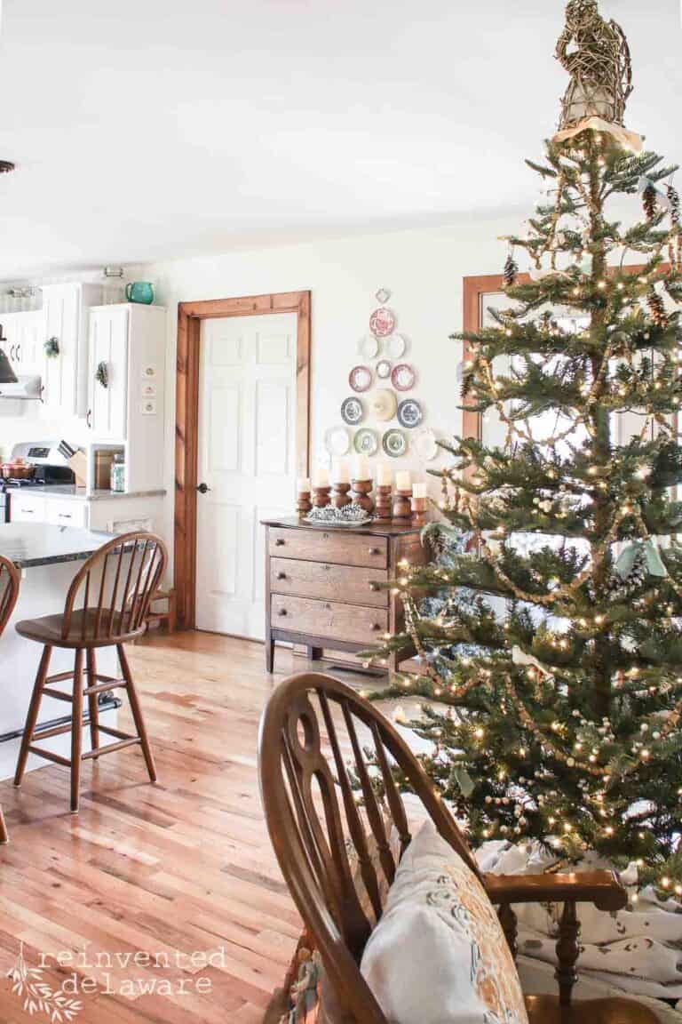 Christmas decorations in a living room and a kitchen