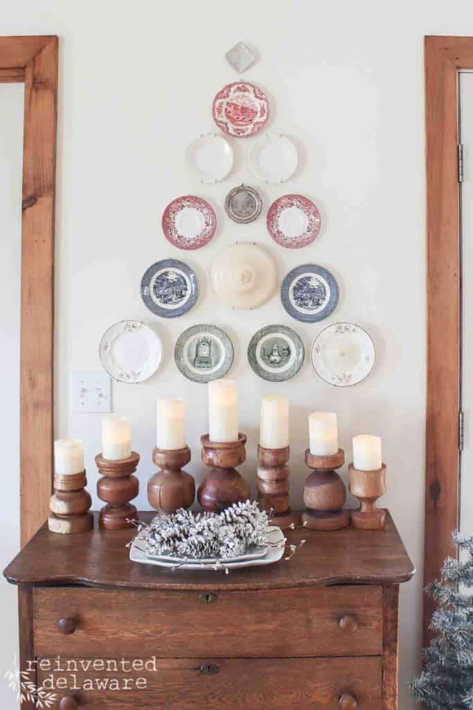 Non-traditional Christmas tree made from antique ironsstone plates on a wall