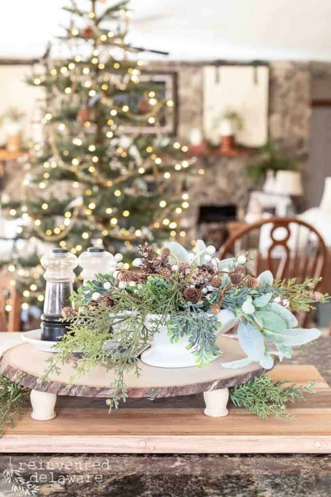 ironstone soup tureen filled with faux greenery for holiday decor