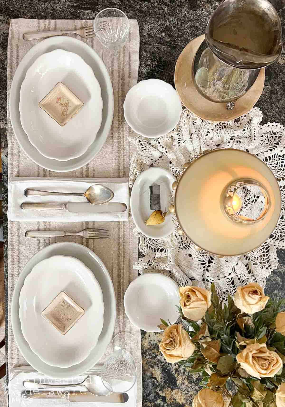 vintage style tablescape with ironstone and antique silver