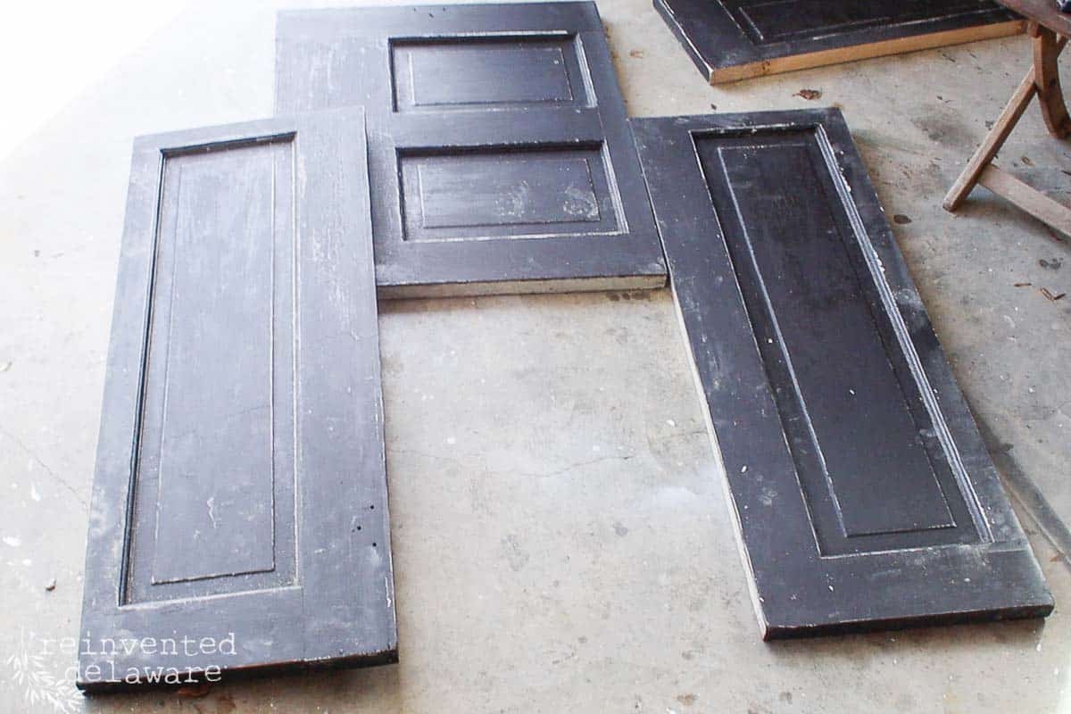 cut up old door to make diy faux fireplace