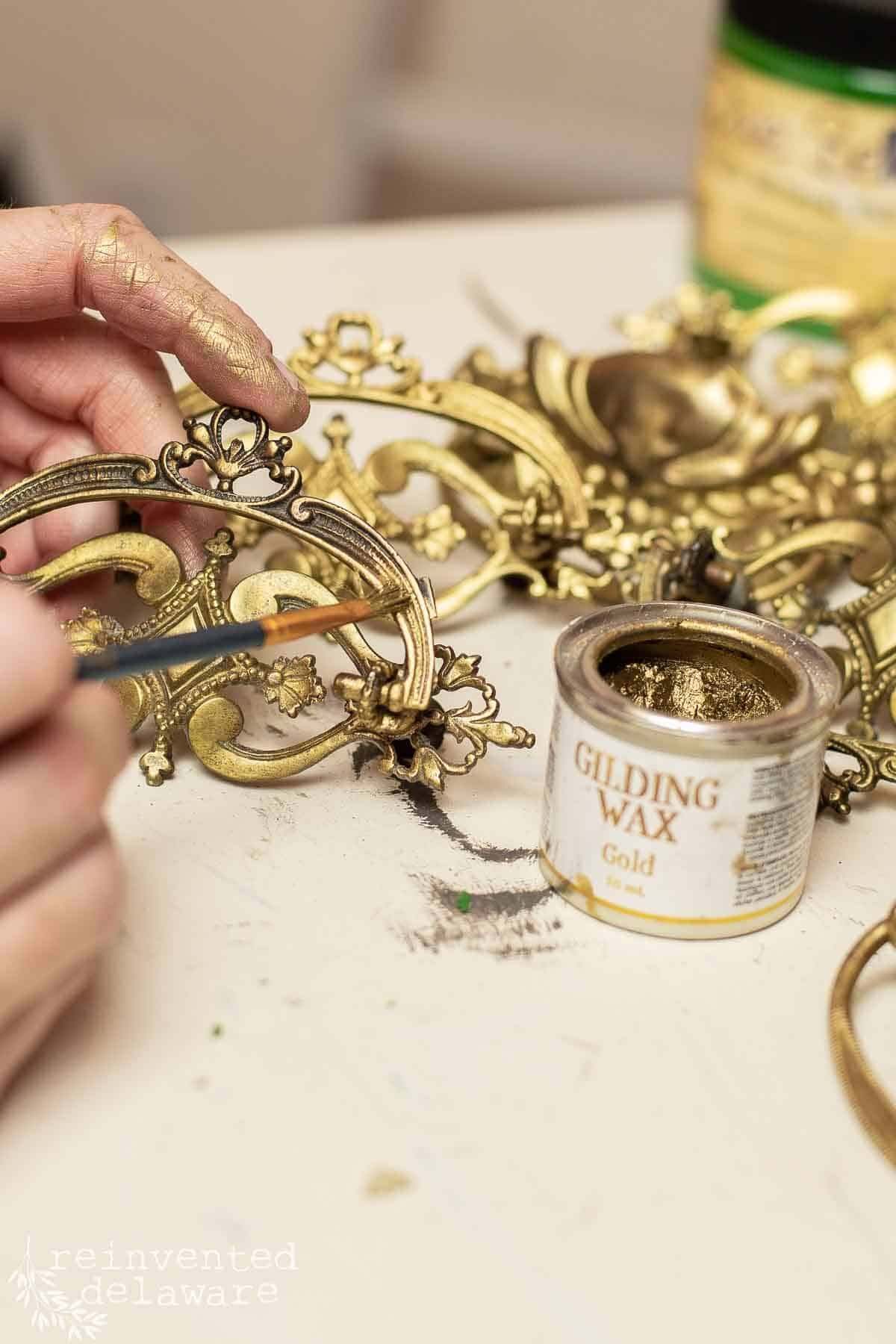 applying gilding wax to antique brass hardware
