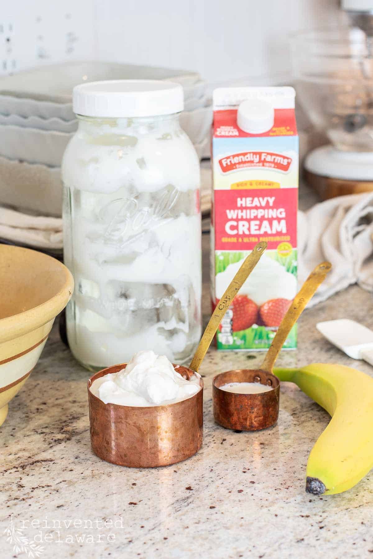 fresh homemade greek yogurt in a copper measuring cup
