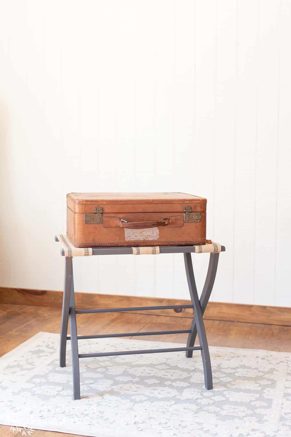 old luggage rack makevoer with vintage suitcase