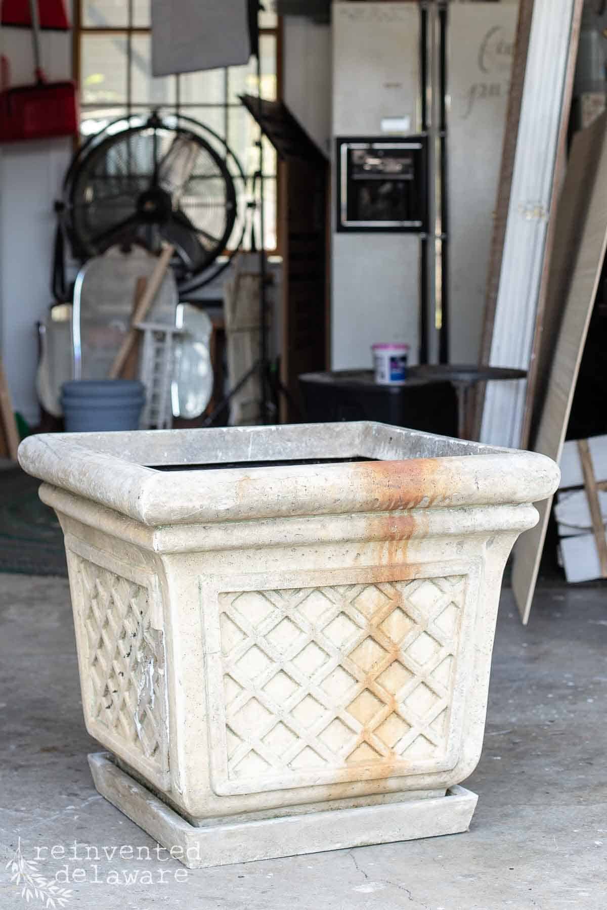 outdoor planter bought an auction that needs a makeover with paint