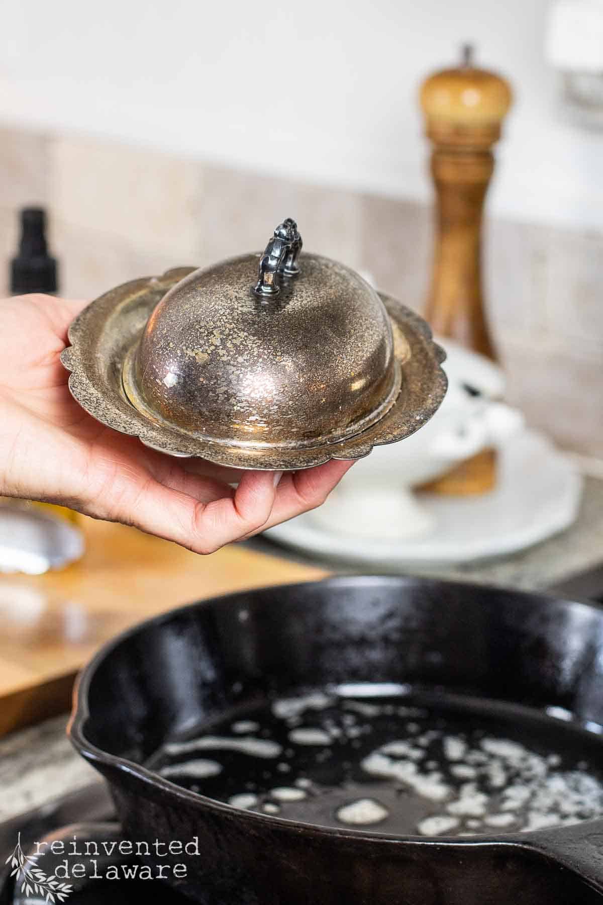 vintage and tarnished butter dish