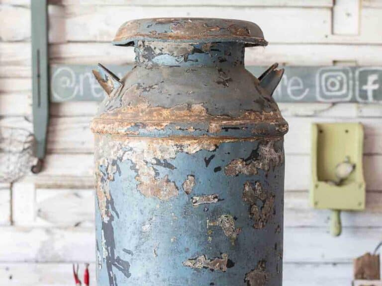old milk can in orginal paint