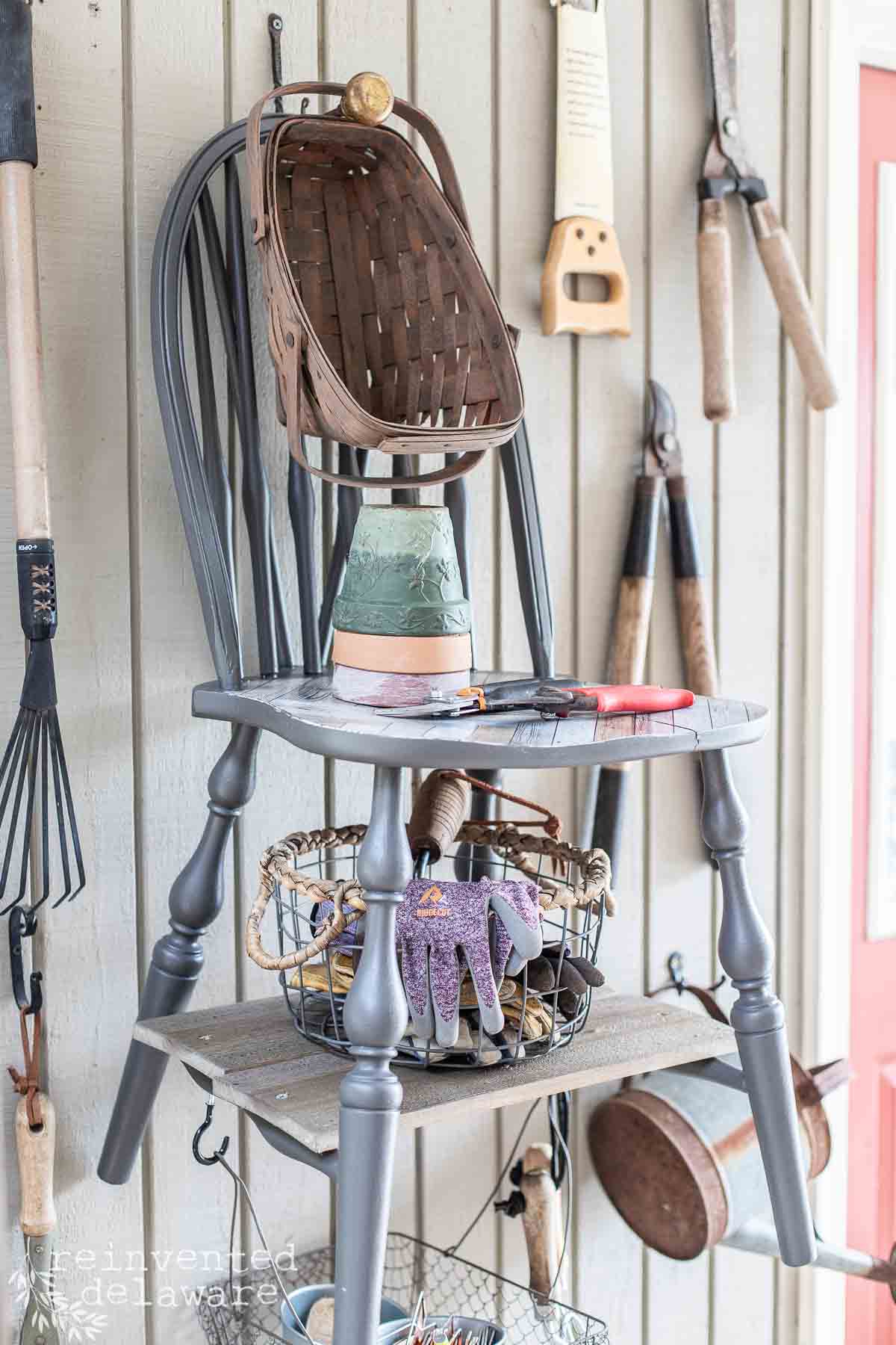 gardening tools organized using an upcycled chair