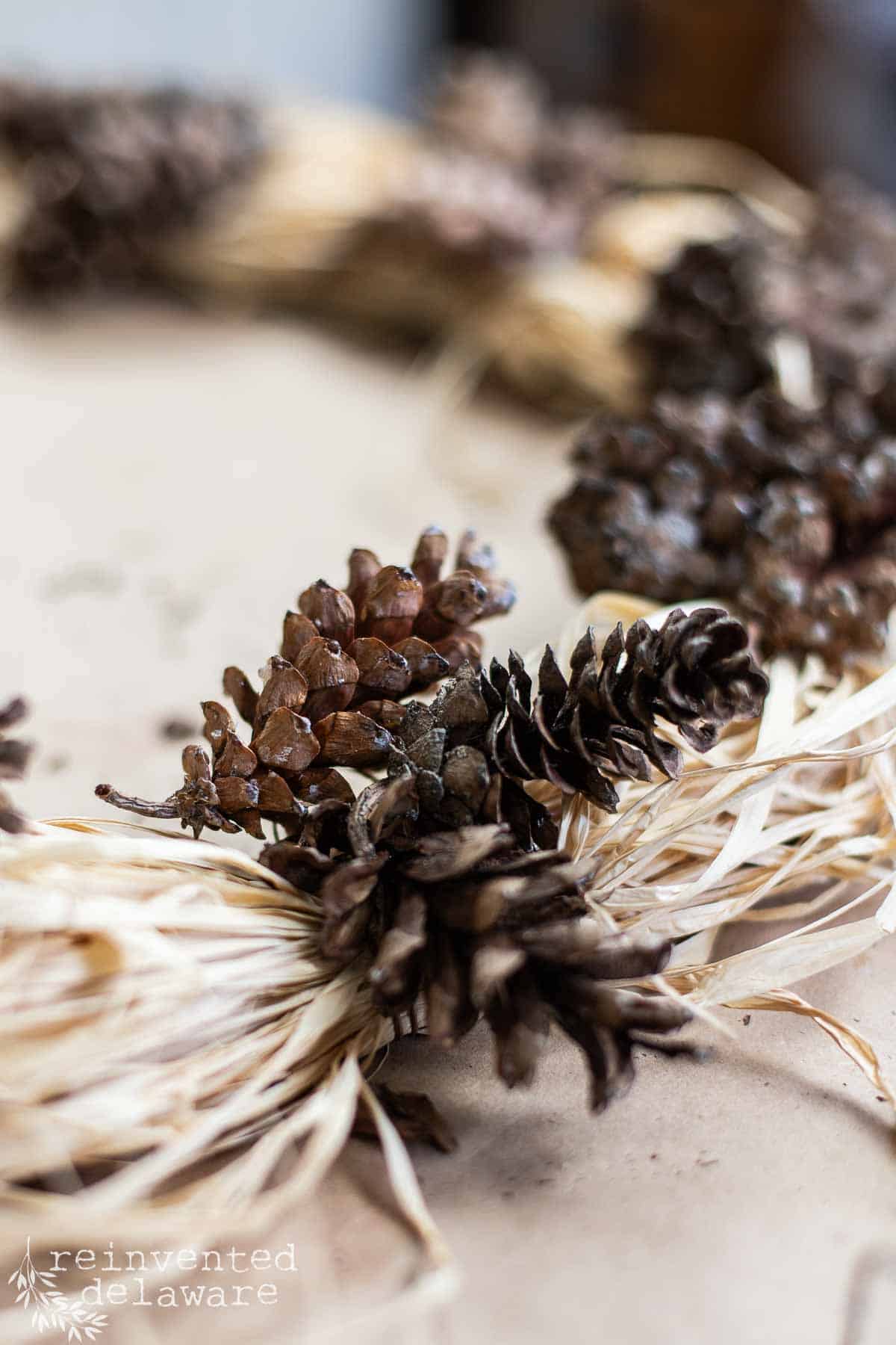 cluster of three pine cones for a DIY pinecone wreath tutorial