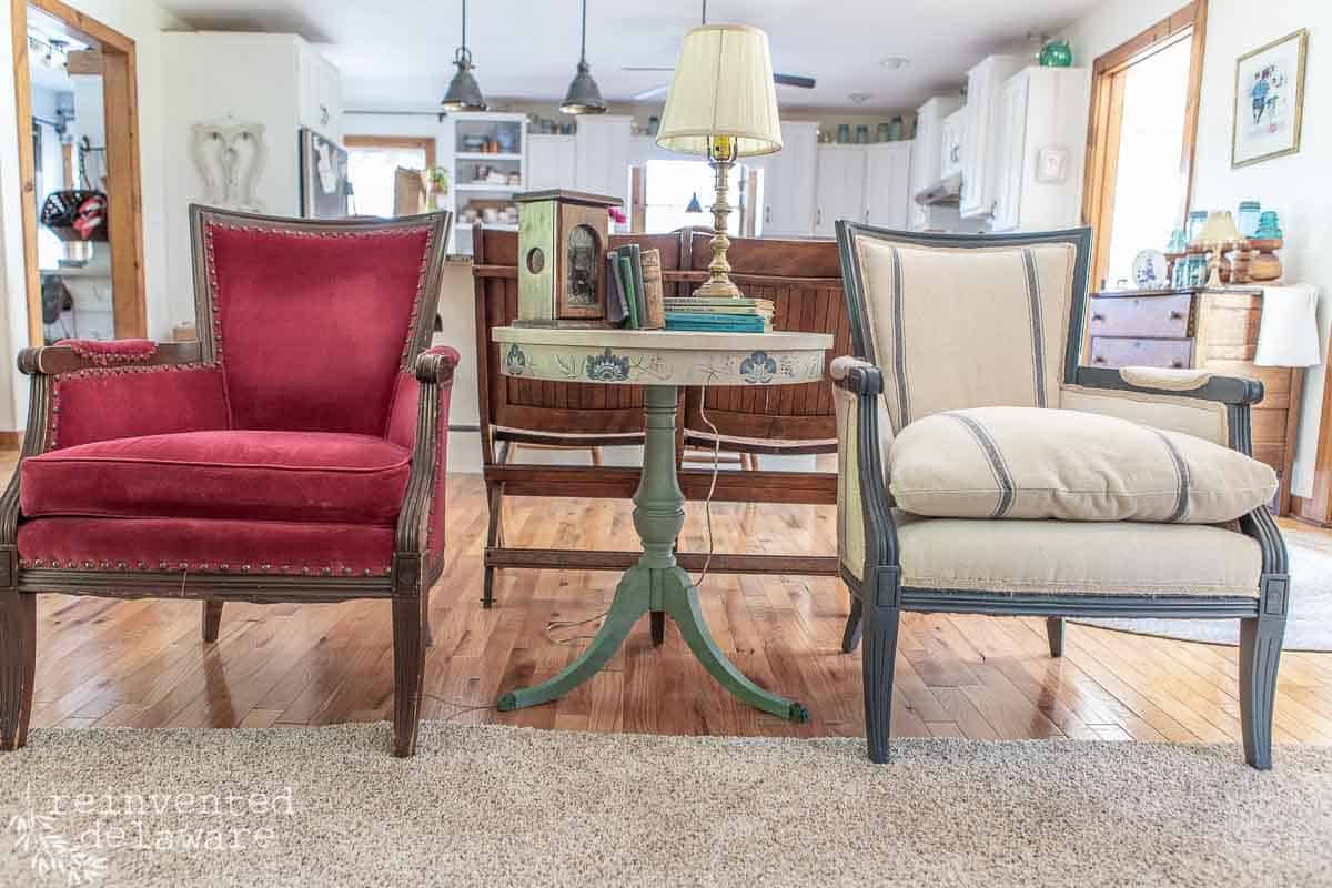 two upholstered chairs with a flea market flip table makeover in the center