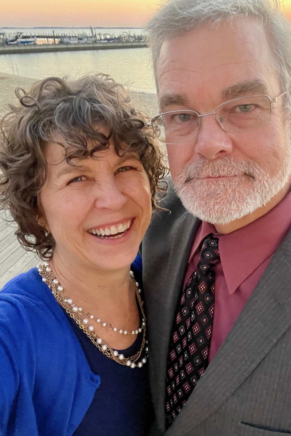 married couple smiling together Cindy and Steve owners of Reinvented Delaware