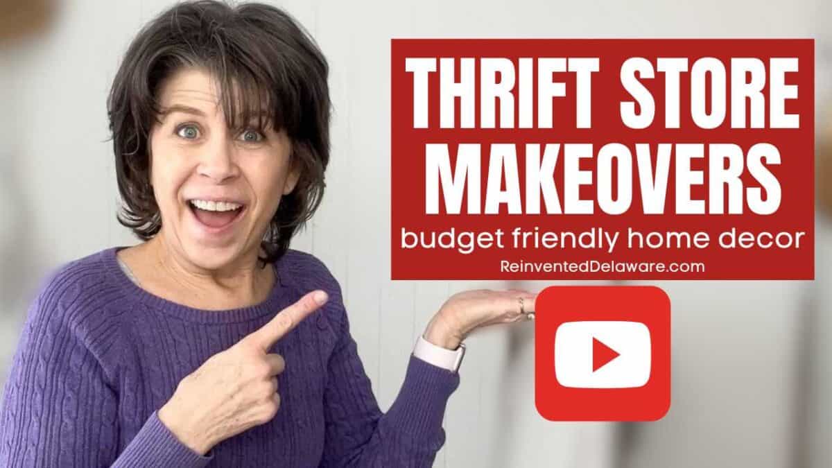 youtube thumbnail image with text overlay "thrift store makeover budget friendly home decor ReinventedDelaware.com" showing a lady pointing at the text graphic