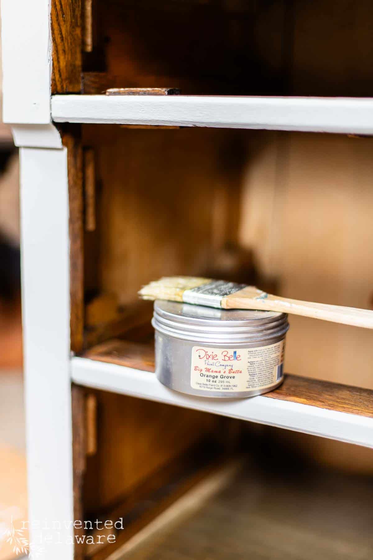 can of Orange Grove furnture sav used to enhance the wood and add scent to the old furniture piece.