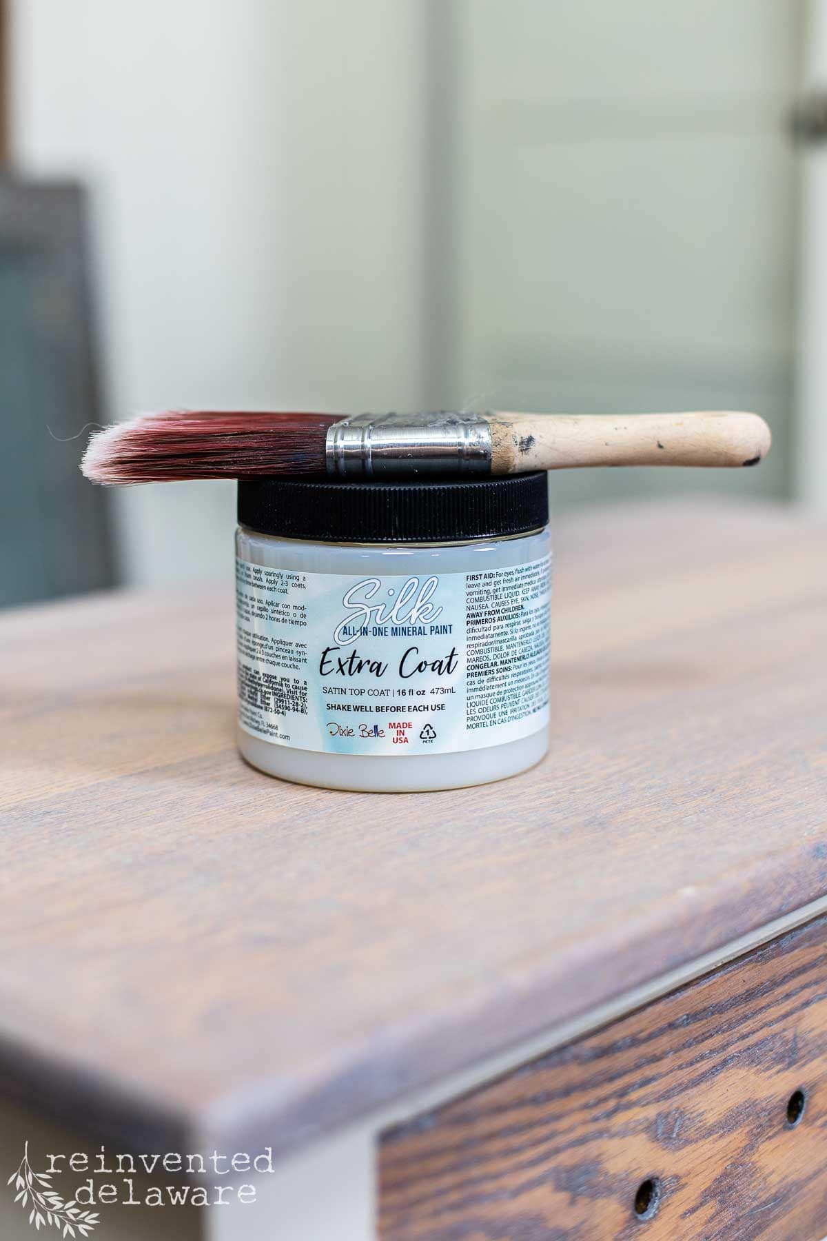 jar of Silk Extra Coat top coat sealer sitting on top of a furniture makeover project.