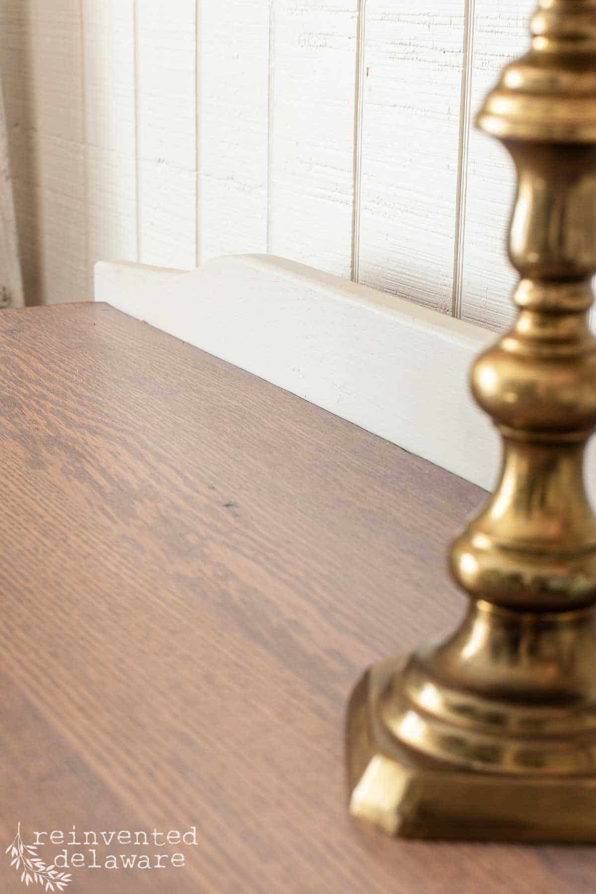 close up of handmade backsplash on an antique washstand