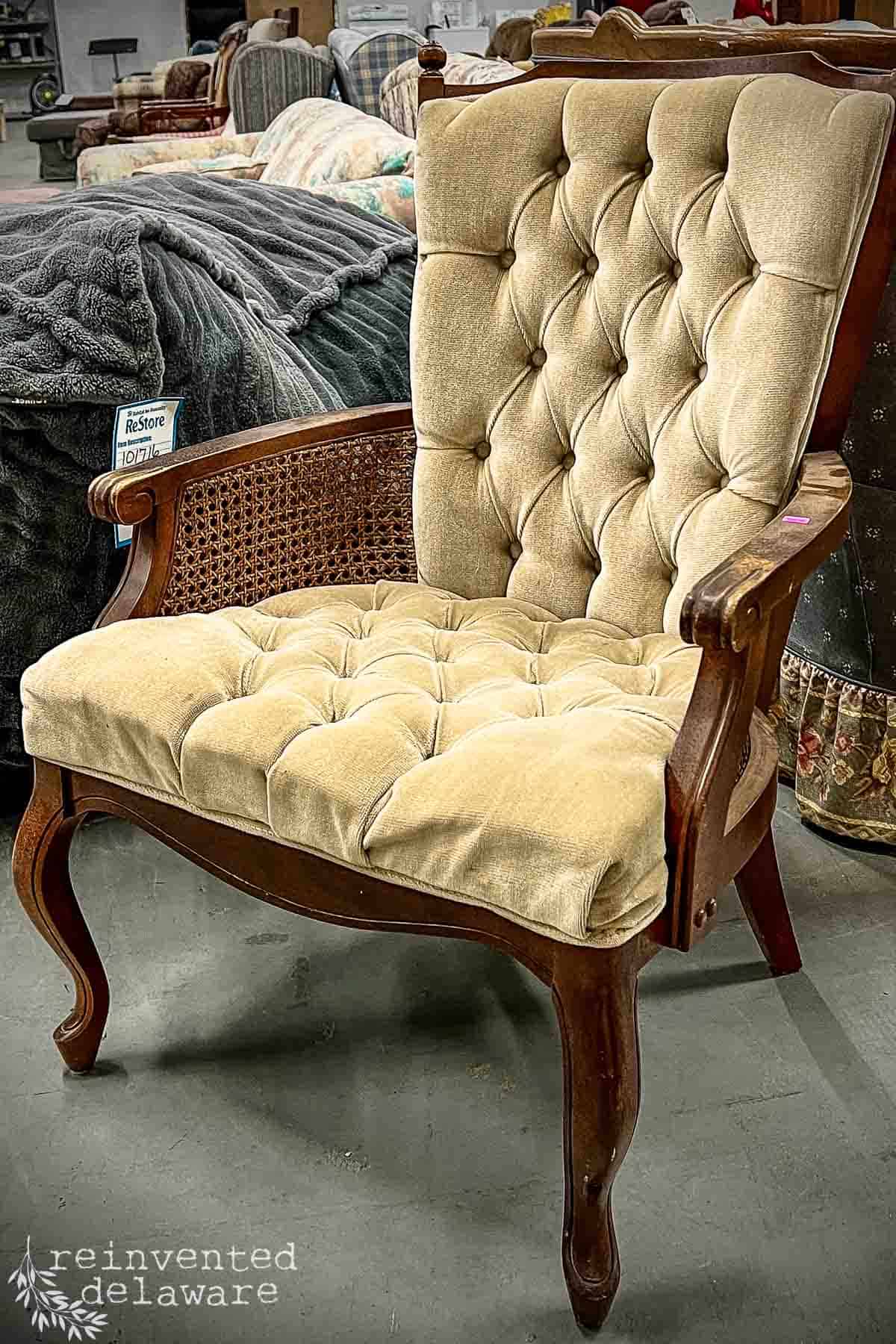 vintage upholstered chair in a Restore retail store location in Delaware