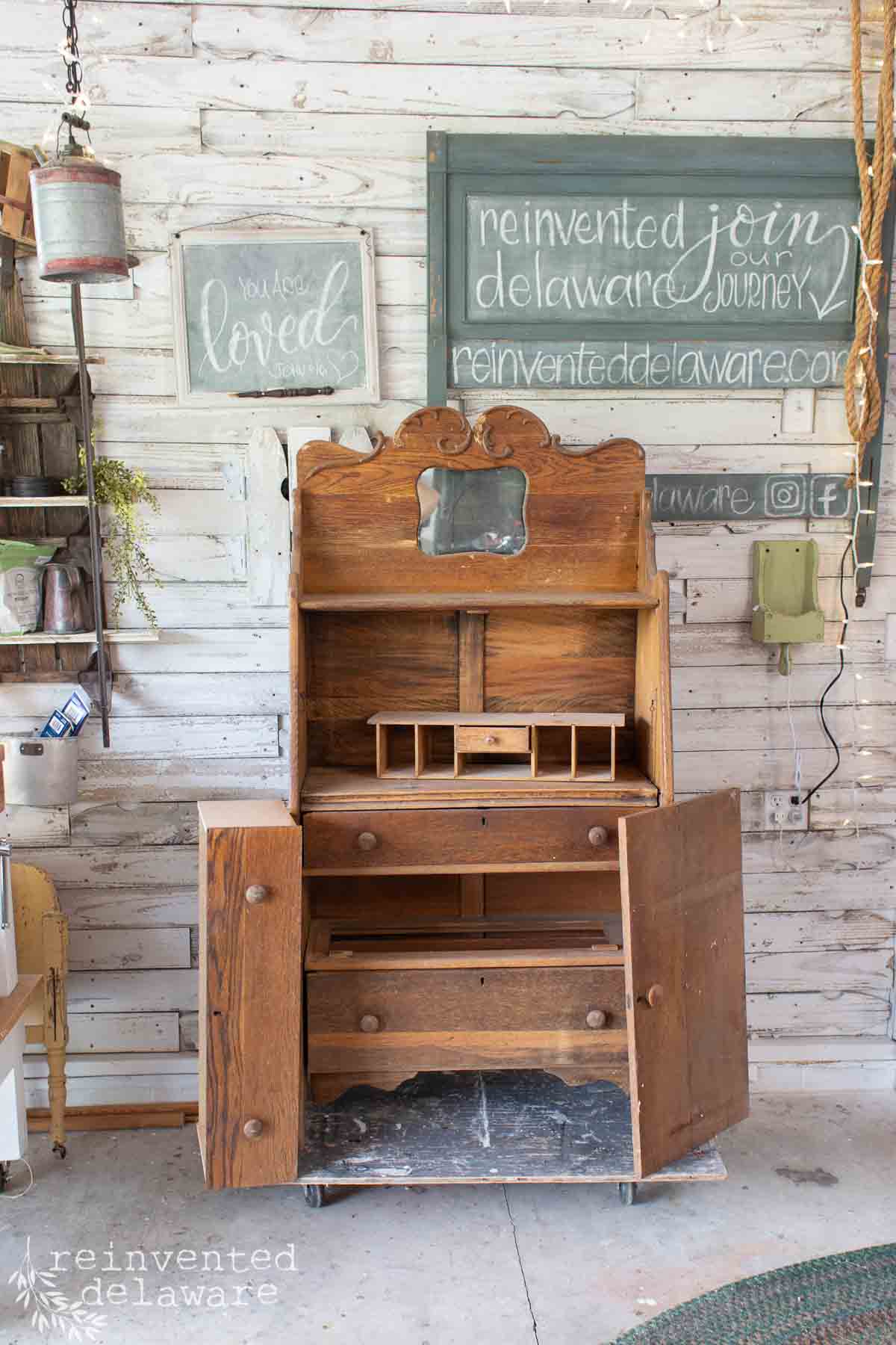 Old piece of antique oak furniture before a whitewashing technique is used to give it a makeover.