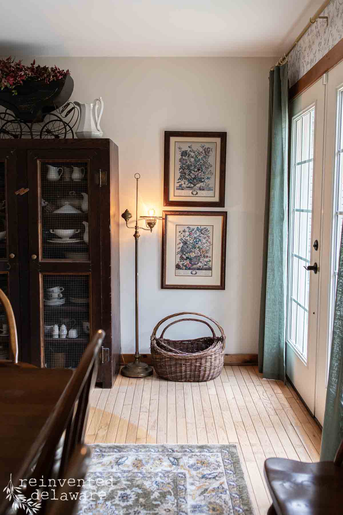 Cozy Delaware home entryway with artwork, basket, and natural light.